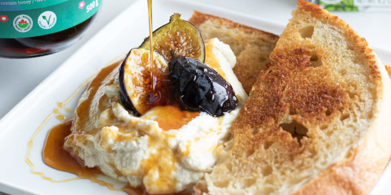https://thesweetpotato.ca/wp-content/uploads/2022/09/Fig-and-whipped-brie-with-bloom-honey2-e1663774520159-1280x640.jpg