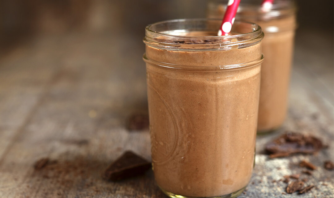https://thesweetpotato.ca/wp-content/uploads/2023/03/protein-chocolate-smoothie-cup-straw_web-1080x640.jpg